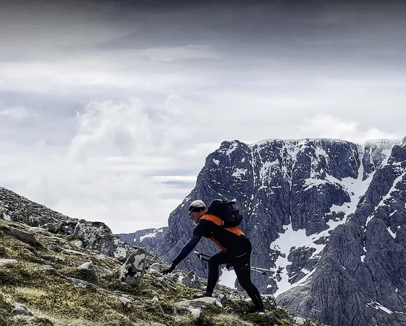 Tony climbing a rocky ridge in the Scottish mountains
